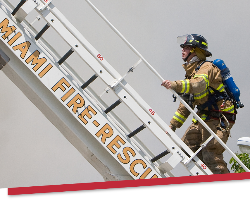 Firefighter going up ladder