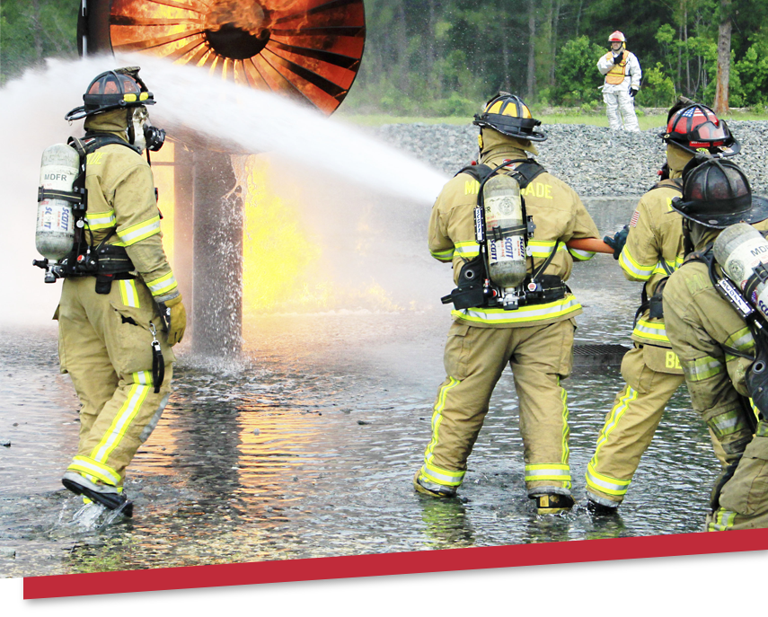 Firefighters with hose Firefighters with hose